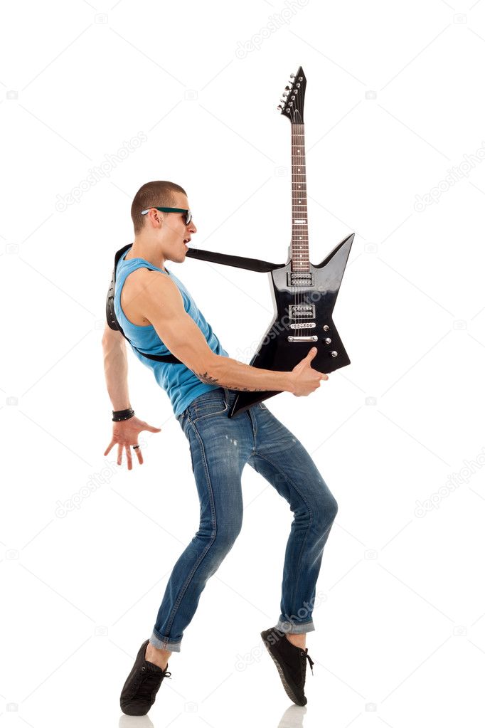 Guitar man in classic rock pose Stock Photo by ©feedough 21940595