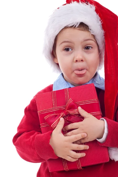 Santa kind tong uitsteekt — Stockfoto