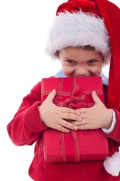 Niño sosteniendo un regalo de Navidad — Foto de Stock