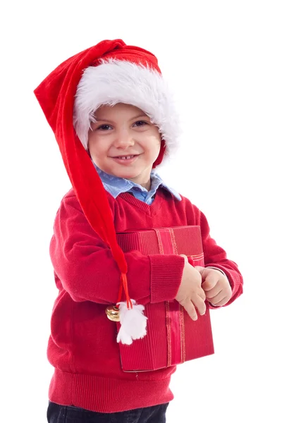Santa παιδί κρατώντας ένα δώρο — Φωτογραφία Αρχείου