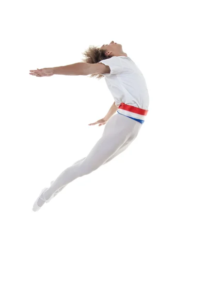 Танцовщица прыгает через белый фон — стоковое фото