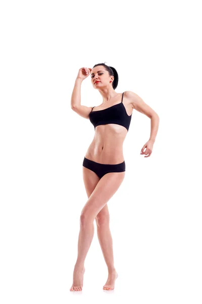 Bikini modell stanting på vit bakgrund — Stockfoto