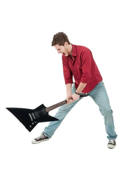Homem zangado segurando uma guitarra — Fotografia de Stock