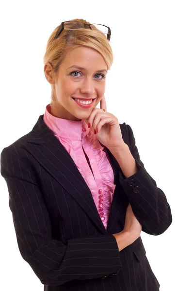 Geschäftsfrau denkt und lächelt lizenzfreie Stockfotos