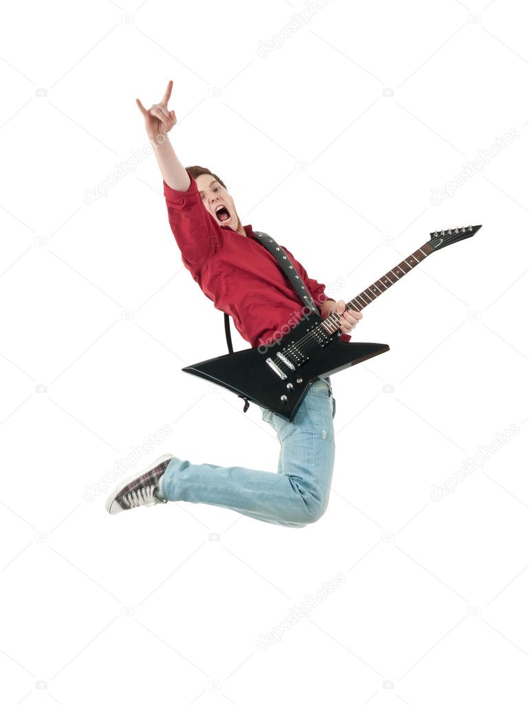 Rock star with a guitar jumping
