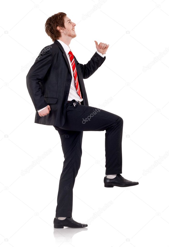Happy business man climbing over white backgroung