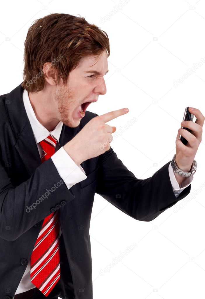 Angry business man yelling at mobile phone