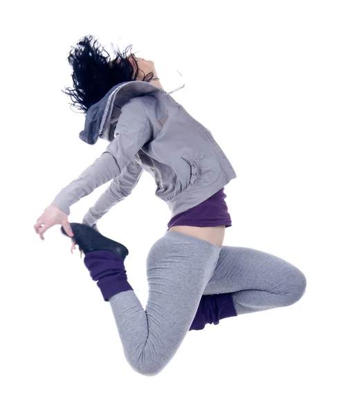 白い背景の上にジャンプの女性ダンサーの写真 — ストック写真