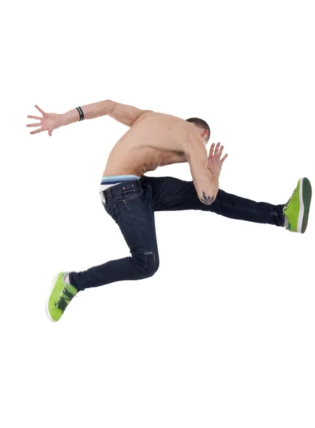 Bir Çok Yüksek Atlama Dans Poz Genç Bir Adamın Resmi — Stok fotoğraf