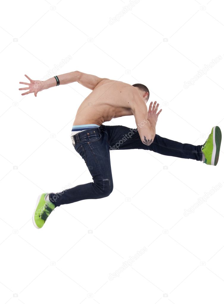 picture of a young man posing in a very high jump dance move