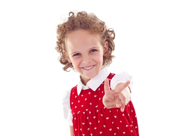 Malá holčička vítězství gesto — Stock fotografie