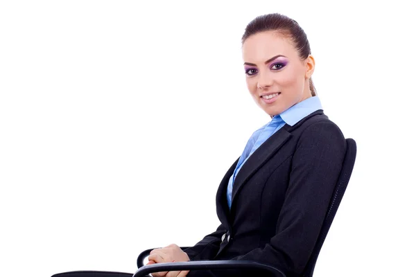 Business woman sitting in a chair — Stock Photo, Image
