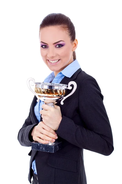 Mulher empresária segurando um troféu — Fotografia de Stock
