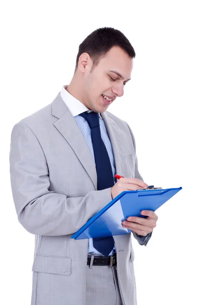 Business man writing on clipboard — Stock Photo, Image