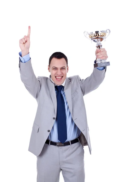 Biznes człowiek trzyma trofeum — Zdjęcie stockowe