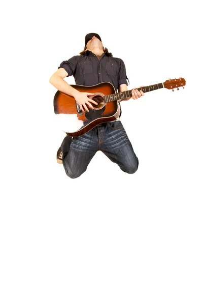 Szenvedélyes gitáros ugrik — Stock Fotó