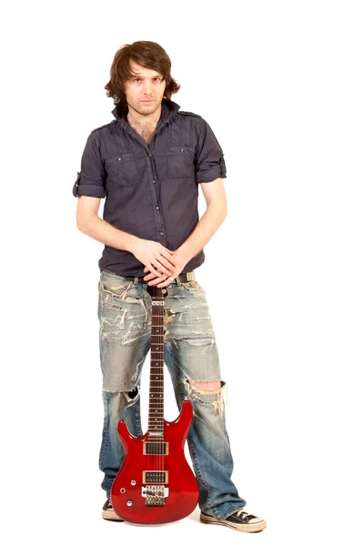 Musician standing with electric guitar — Stock Photo, Image