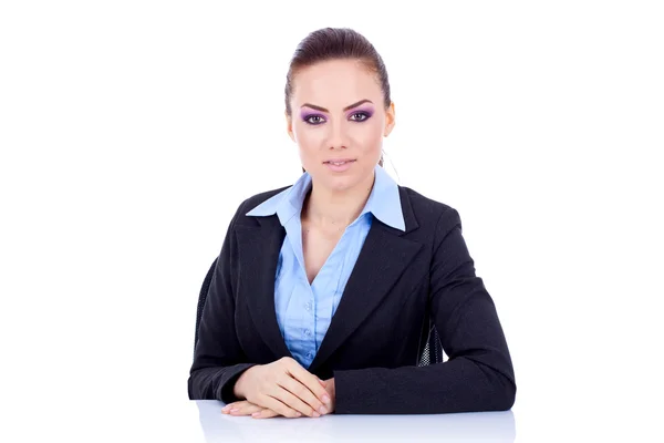 Business woman behind the desk Stock Image