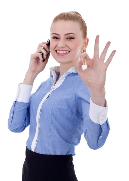 Obchodnice s telefonem a ok gesto — Stock fotografie