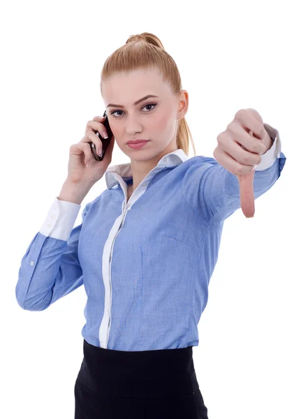 Serious woman gesturing thumbs down — Stock Photo, Image