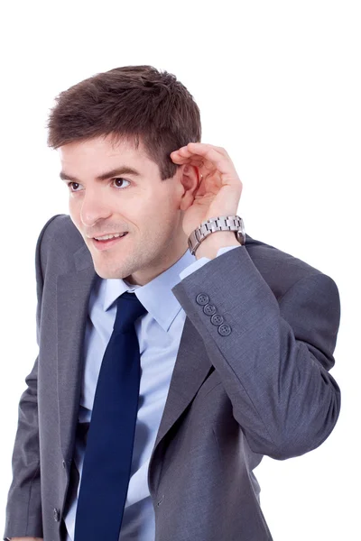 Ο άνθρωπος των επιχειρήσεων κοιλάνει χέρι πίσω από το αυτί — Φωτογραφία Αρχείου