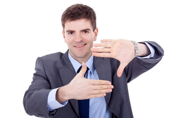 Homem de negócios fazendo uma moldura de mão — Fotografia de Stock