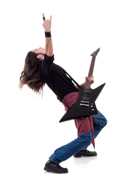 Guitarrista está tocando y haciendo una roca — Foto de Stock