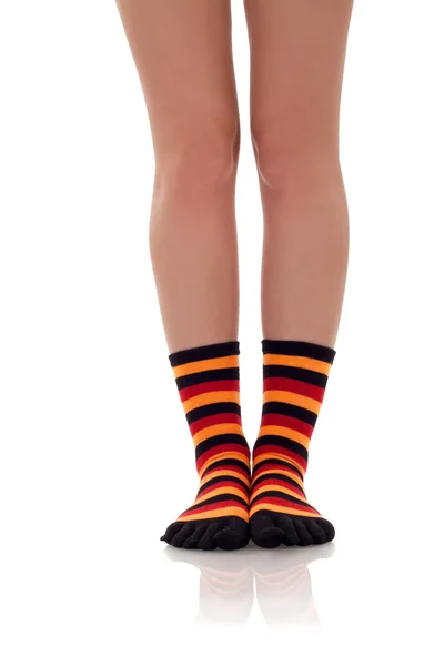 Frauenbeine in Zebra-Socken — Stockfoto