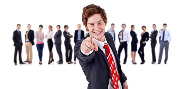 Business leader pointing at the camera and his team — Stockfoto