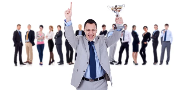 Vinnande businessteam ledare håller trophy — Stockfoto