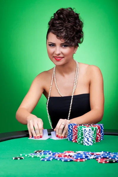 Dealing cards at poker table — Stock Photo, Image