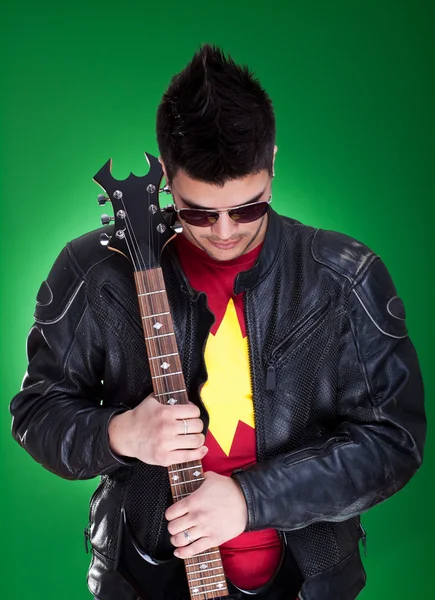 Guitarist in black leather jacket — Stock Photo, Image