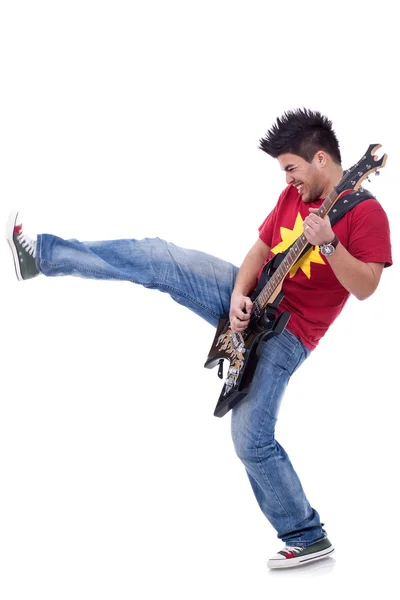 Kicking guitarist — Stock Photo, Image