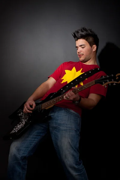 Rock star playing solo — Stock Photo, Image