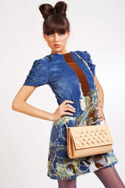 Casual young fashion holding bag — Stock Photo, Image