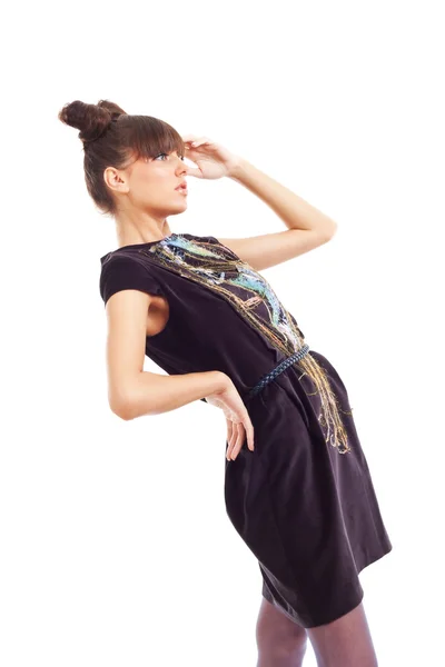 Fashion model in a dark colour dress — Stock Photo, Image