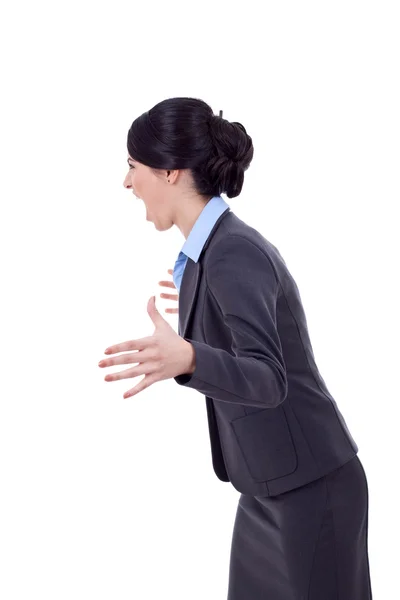Angry business woman screaming to a side — Stock Photo, Image
