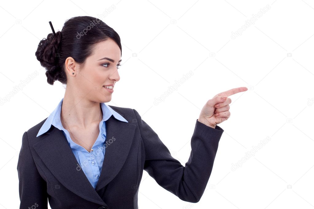 Woman points finger at something in her left