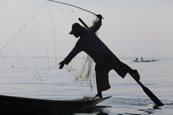 Pescatore sul lago Inle Immagine Stock