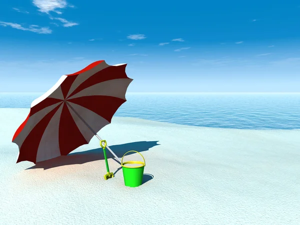 Сонячний парасолька, відро і лопатка на пляжі . — стокове фото