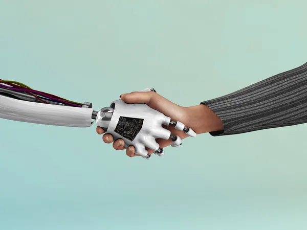 Roboter schüttelt Hand mit Mensch. — Stockfoto