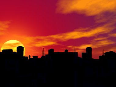 Gün batımında bir şehrin silueti.