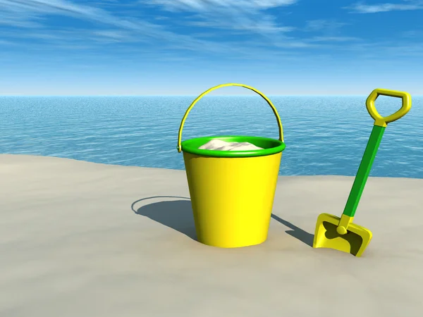桶和小铲在海滩上 — 图库照片
