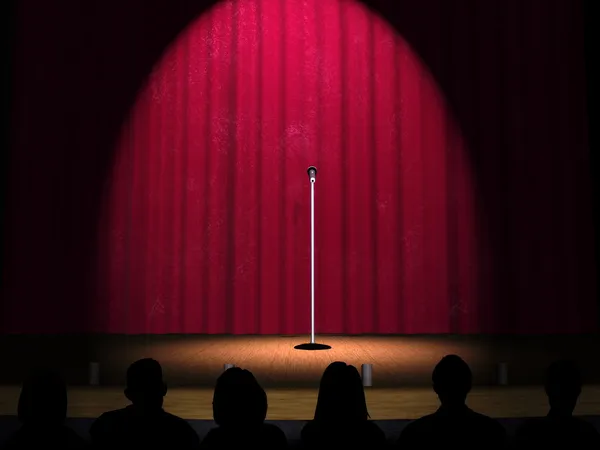 stock image A microphone on a stage