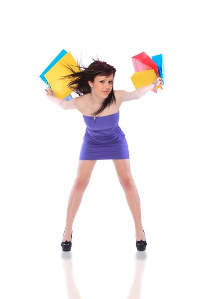 Güzel Genç Kadın Ile Onun Elinde Renkli Alışveriş Torbaları — Stok fotoğraf