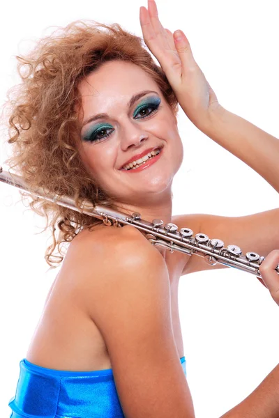 Portrait of a woman playing flute — Stock Photo, Image