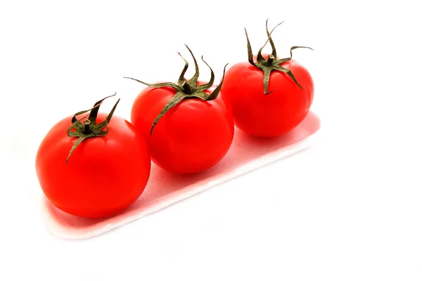 Três tomates Imagens De Bancos De Imagens