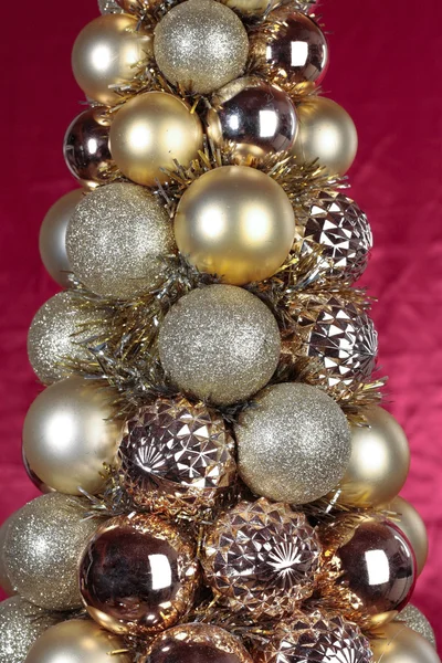 Christmas decorations closeup over red — Stock Photo, Image