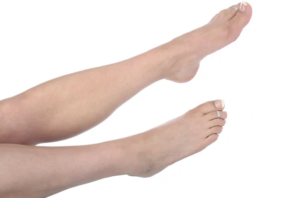 白い背景で隔離された女性の足 — ストック写真