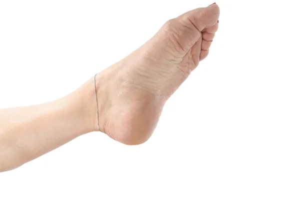 Mulher pés sobre fundo branco — Fotografia de Stock